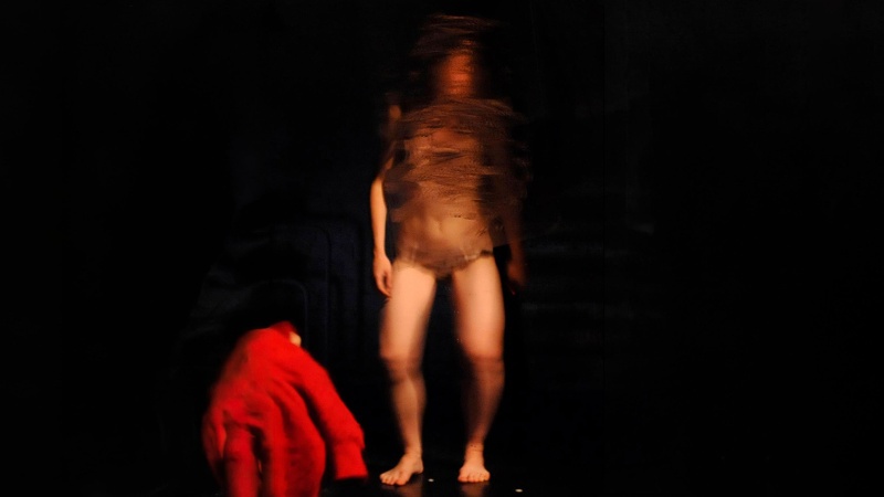 Charlotte Bouckaert photographs her own body live and explores how we look at the female body.